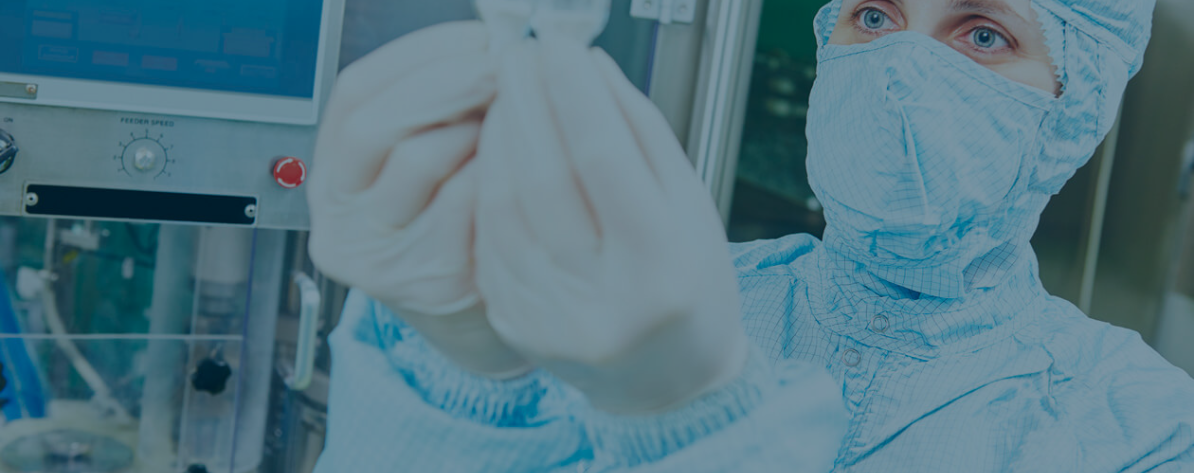 Woman in a laboratory inspecting a medicine as part of pharmaceutical quality control - MEGLA
